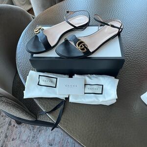 Gucci Black Sandals with Gold Detail